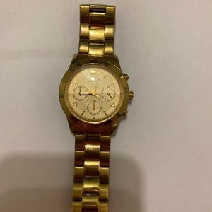 Gold color Watch Guess